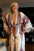 Fits to a tee.  So many compliments on this dress. - Petina M.