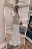 After seeing this dress I spontaneously ordered it 29 days before my wedding, crazy I know! I'm normally a medium but based on the review that a scoured before ordering I decided to size down and it was a good choice to order the small. It fits perfectly and is definitely long enough for my 5'10" frame. And as other people said you'll have to be mindful of any shapewear you have underneath because you will see lines because of the tight fitting quality. But I definitely don't think it's see-through! And I'm adding removal bra pads just to add a little extra support for my chest but it could definitely go without it. All in all it's a great quality material dress that comes at an amazing price! - Lydia N.