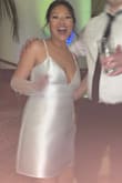 Purchased a very similar dress that was poofier but this was more flattering without being too tight. I was able to dance all night. I styled with some Pearl gloves. Loved how the material was still glam and had a bridal feel. - Molly K.