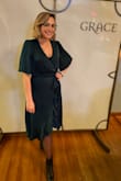 I bought this dress to wear to an event I was hired for and it was great! My only issue is that the size I needed to fit my body made it so the chest area was too big and my bra was showing. Other than that it was great! - Erica S.