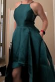 The dress is really pretty and it fit well enough. I was spilling out of it a little bit in the chest. The real problem for me was how much bulk and fabric there was. The photo looked like a more satiny material and this dress is very heavy. With all the pleats and the length you could hardly notice that the front was a high low because it swallowed me up. Would work better on someone taller. - Erin C.