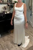 This is a very high quality dress. The material is thick, silky, and very comfortable. I loved the neckline and low back. - Lauren B.