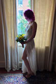 I wore this dress for my wedding just a small city hall affair and it worked very well. It was a bit long for walking around the city but a quick hem fixed the issue. It is definitely very sheer on the legs but doesn't show anything inappropriate just something to keep in mind if you're more modest. The dress sits nicely I had no worries about straps slipping. - Deviney A.