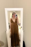 I got this dress for a wedding and it fits so perfectly! I have a small chest and normally need dressed taken in at the top, but the adjustable straps help out so much. The fit is also very flattering. Highly recommend! - Meagan R.