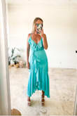 The moment I pulled this dress out of the bag I NEW it was keeper! The color is unlike anything else I have ever owned. I ordered a small and MAY need to take in the sides up by my armpits - if I'm being picky. It has adjustable straps too. The neckline is beautiful. The feel is luxurious. I love that it has a slit and a mermaid loose cut. I ordered this for a rehearsal dinner by the beach! - Lynn H.