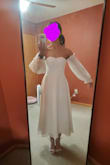 I'm so glad that I ordered this dress. The material is good, and the style and size fit me perfectly. It looks better in person than in the pictures. I honestly think I could use this for my garden wedding dress although I got this for after party dress. - Anna U.