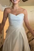 I had a nightmare with my seamstress who ruined my dress. Getting married in just a few months and this dress is a dream, I actually like it more than my original!! There was only an 8 available, I normally wear a 4 or a 6, and it's just slightly too big so I would say it runs just a little small. So worth the money, it feels like all the designer dresses I had tried on. 10/10. I will say the slit is a little high but I'm having it sewn a little. - Madison G.