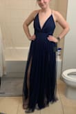 This dress was fun and simple and would look good for causal or dressy events depending on how you accessorize. Slits are high. Adjustable straps very helpful - Marissa L.