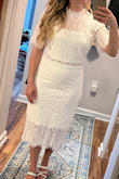 It's a beautiful dress that I would buy if it was ever available in an XXS. I love the neckline, and the two-piece with a lace overlay makes it appropriate for a bridal shower but with a little something extra. However, it's entirely too large in every aspect. Too wide in hips, sooo loose in the bust area, and the neck is even too big. It's also much longer than expected. - Katie A.