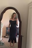 I got this dress for a wedding. It fits perfectly. No gaps. The material has a little stretch to allow it to conform to curves. - Michelle H.