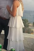 Purchased for our rehearsal dinner last minute when the other dress I ordered didn't work. This dress is comfy, so cute, and flattering, and was perfect for our destination wedding location! The buttons were difficult to button so had to have some help, otherwise, loved it! - Courtney C.