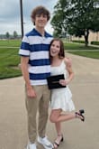 I bought this for college graduation and absolutely loved it. It was comfortable but also looked classy. It looked great in pictures. It was super flattering, even on a flat bust area girl like me! The material is super soft and cool, and any wrinkles come out easily. Get it!!! - Kiley C.