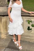 Love the dress so much and wore it for my graduation but I it runs a little bigger around the bust but was perfect around the hips and waist. - Luciel E.