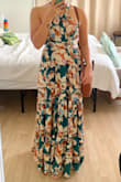 Bought this dress for a friend's wedding in Hawaii and loved it! It does run very long so had to hem the bottom. But the dress is really comfortable and love the open back. - Monica C.