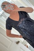 I usually wear a small, but needed more room in the bust. Medium is perfect for 38" (34D) bust. Dress is not too short. Sequins are layered well (thick) and feels like quality sewing on of sequins and construction of the dress. Color is dark blue just like those Swiftie Midnights! - Deborah R.