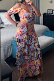 This dress is gorgeous, I've gained 17 unwanted pounds, and this dress hid it all. With one sleeve up, one down, and it's flowing. - Stacy J.