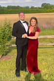 I loved it. It was comfortable except I had to boob tape my boobs within an inch of their life in order to dance comfortably. Regardless, felt great and was perfect for a black-tie wedding. I wore flats because I have a bad foot. It was nice that the slit is in the back not the front so you can't see my flats in any of the pics. I'm 5'8 and it was the perfect length. No hemming needed. - Andrea R.