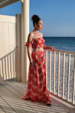 I loved this two-piece. Skirt is a little long so wedges were required but otherwise very comfy, flattering, and received endless compliments. - Angelique R.