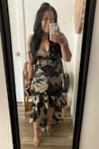This was my first Lulus order and I was very impressed! I loved the look of this dress so much but was skeptical to order because I was afraid it would be too long for my petite size but thankfully my 4" block heels made it work. I ordered the large and it fit comfortably. A little long but with my shoes, I maybe had less than a half inch hit the floor which I didn't think was a big deal. The top part was a little snug but I was comfortable the whole night. The adjustable straps were perfect to accommodate my smaller chest. I'm also 4 months postpartum here and the floral midsection helped hide some of my belly. Overall a perfect dress for a wedding! - Rebecca F.