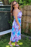 Bought this dress for Mother's Day. I love it. The colors just beautiful. I bought in Large base on the reviews and I'm glad I did. - Bianny L.