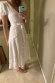 It's a bit wrinkled and needs a steam but this dress is actually so lovely. - Nicole M.