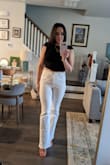 Cute top. Material is thick and seems like good quality. I had to pull the tag off cause it kept rolling and exposing itself. - Nicole U.