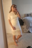 Such a beautiful white dress. I almost wore this as my elopement dress but ended up going with something different. 

Runs slightly big. I typically wear a small and got this in x-small.  For reference, I wear most Lulus dresses in an x-small.  It's a little tight so it shows off your figure nicely - Kaitlyn L.