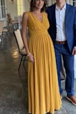 I had to get the bust and length altered which is why I didn't give five stars. I wore this to a gal wedding. It's comfortable and the color is amazing. - Sarah D.