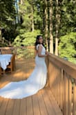 Bought this for my city hall wedding. I ordered a L and XL to compare. I kept the XL as it fit my bottom better and got the top altered to my size. Turned out to be the coolest dress ever! - Aneesha M.