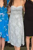 I was surprised to order a size small and have it be a little loose around the bust. The straps can be loosened or tightened, which was nice and helped the dress fit. The color is lighter than you would think but still pretty. If you have a bigger bust, you will be showing a lot of cleavage - Danielle M.