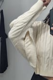 This actually looks quite cute, fits well, is soft, BUT has the weirdest sleeves ever. It's more a poncho than a sweater. The sleeves are about 10 inches long and then the rest is an open cut, which is cold and especially inconvenient for raising your arms. - Ro M.