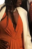 It was an amazing dress that I wore for my friend's wedding. I felt amazing and the dress hugs your curves just right. I did buy nipple covers and clothing tape to hold it in place better at the chest area. - Helana C.