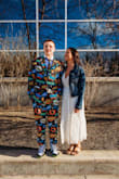 I wore this dress to my son's 8th Grade Graduation and it was absolutely perfect! It looked nice and was so comfortable. Paired it with sandals and a jean jacket for a more casual look. It is slightly low cut but not too revealing. - Jessica L.