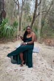 I loveee the color or the dress. Did a lil adjustment to the shoulder and arm area to make it more snug. The dress is way too long but i didn't adjust since i was wearing heels. - Yanique F.
