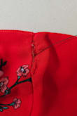 The dress is pretty and I was so excited to take this with me on my cruise this weekend. However, this is yet another Lulus item I have ordered recently that has arrived damaged. The top has a seam where the fabric is shredding and coming apart. It is where they attached the tag (as shown in the photo). I think this is now the third dress within a few months that has arrived damaged. I was a happy Lulus customer for years, but won't be ordering from them anymore. - Jilliian W.