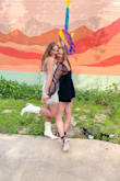 I bought this for a bachelorette party and was so happy with how I looked! It's short but since it's a romper it was still providing the coverage I needed and had a sexy, flattering cut. I felt super cute and it fit perfectly. - Jenna D.