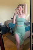 I first ordered this in pink and it just wasn't for me. The color was awesome but I'm just not that girl. I reordered in Sage and I LOVE IT! I ordered size M and I'd say it fits me as I expected it to. Both pieces are super flattering, I did have to buy some boob tape for the top for when I do wear this out, I'm personally not a fan of strapless bras. It will look great dressed up as the set or dressed down a little with a different top! The skirt does need to be steamed or ironed since it's folded, it does arrive wrinkled. I did roll the top of the band twice to get the slit to sit nicer on my leg, but if you're taller that probably isn't necessary. - Alexis C.