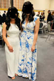 I adored this dress. The exposed back with the ruffled sleeves and deep cut yet modest front was the perfect combination of feminine and classy but still with a little extra "umph". It was long on my short stature but I wore 4" heels and didn't need it hemmed. This dress felt like a show-stopper! Lots of compliments. - Yvette E.