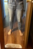 These jeans are much looser around the thighs than shown in the model photo. I wanted to try a smaller size but was concerned the waist would be too tight. So I kept them. They are okay for the first wear but get much too baggy after that, making me look heavy. My photo is after wearing them for a few hours. Don't love them like I'd hoped. - Kendall T.