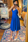 Fit perfectly. I ordered an xs ( my usual size) but I like a more snug fit. The pics are right out of the package, so the dress is a little wrinkly. I had it steamed at a dry cleaner before the event and it came out beautifully. - Elizabeth V.