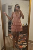 This dress wasn't made for me. I ordered a size down because the reviews said the boob section ran large. Even with the xs, there was too much room in the boob area. Also I didn't realize until trying it on, but the mauve pink color againt my skin looks so bland and drab - that's obviously my mistake in choosing the mavue pink. Returned it today. - Dianna D.