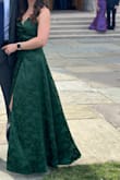 I LOVED the fabric and fit of this dress, I felt like royalty! But it is extremely long. I hemmed it up an inch and it was still far too long for walking/dancing. If you're under 6 foot and willing to get it hemmed then it's an amazing dress! - Megan R.