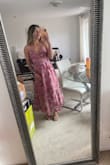 I saw someone wearing this at a wedding and fell in love and had to get it for the wedding I was attending. I was a little nervous for the fit and length since I am shorter but it was the perfect length. It also helps that the straps tie at the back so it makes it easily adjustable for the perfect fit. - Katlyn S.