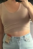 I love the top on me - it's versatile and lightweight, which is good for a hot day! But the material is very thin and seems like it's easy to get holes or damages. I would be extra careful with this one and ensure it's well taken care of, otherwise, it wouldn't last long. - Jenny H.