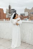 So I never ever write reviews but I felt like it was my obligation to write one for this dress. I got pregnant a month after paying for my wedding venue. I had my daughter 3 months ago and I'm getting married in 3 weeks. Well, I tried to lose all my pregnancy weight in time but it wasn't happening. I can't fit into my wedding dress. I saw this dress online, saw its price tag and had to buy it. I was skeptical; no wedding dress this inexpensive would be good quality. I was wrong! I love the dress, the quality is amazing and it's sooooooo flattering! I don't have any pictures yet but I'll be sure to post some up once I say my I Do's. If you're hesitant, GET THIS DRESS! - Bretta M.