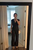 This is such a cute jumpsuit! I'm giving it five stars because I love it but I just want to make sure people know of a couple of things that I noticed -- on me, the seam above the waist was a little tight but I still definitely chose the right size, and it's long! I'm 5'7 and wearing 2" platforms in the picture and it's still touching the ground. Great for the taller girlies but you might need some hemming if you're shorter. All in all, though, I love this! The open back is so fun and the adjustable ties make it easier for it to fit more sizes. - Caroline W.