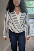 The material is not that good, I didn't like the texture of it. It looks beautiful, I ordered a size M and it felt big on me. - Gabriela S.