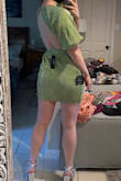 I've had my eye on this dress for a long time and FINALLY pulled the trigger as I'm in a bridal party for which each bridesmaid has been assigned a color - mine is green so at each wedding event I will wear a different green dress. I really love this dress. Small is true to size. A little on the short side, and I am short, but I also have hips so that doesn't help. As long as I'm careful I don't think I'll flash anyone... Otherwise, it's secure, decently made, and I'll probably wear pasties or some other creative bra to lift/secure since the back is open. It's flattering to my shape and I think it's unique overall. I can see how the glitter will fall off easily but that doesn't take away from my satisfaction with the dress. It's breathable and lightweight. I'm glad I bought it, worth the price and I don't have anything else like it. - Katherine Y.