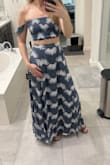 Fit is flattering, super comfortable and the top is secure. Feminine and breathable, lightweight, and luxurious material. Love it! - Katie M.