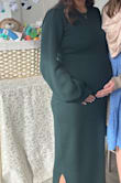I bought this for my baby shower at 32 weeks in early February and it was absolutely perfect. Happy to be able to wear this dress again since it's not maternity. Thick and incredibly soft material. I got numerous complements! - Cayla M.